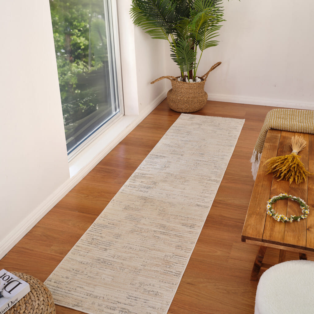 8' Gray and Beige Geometric Distressed Area Rug