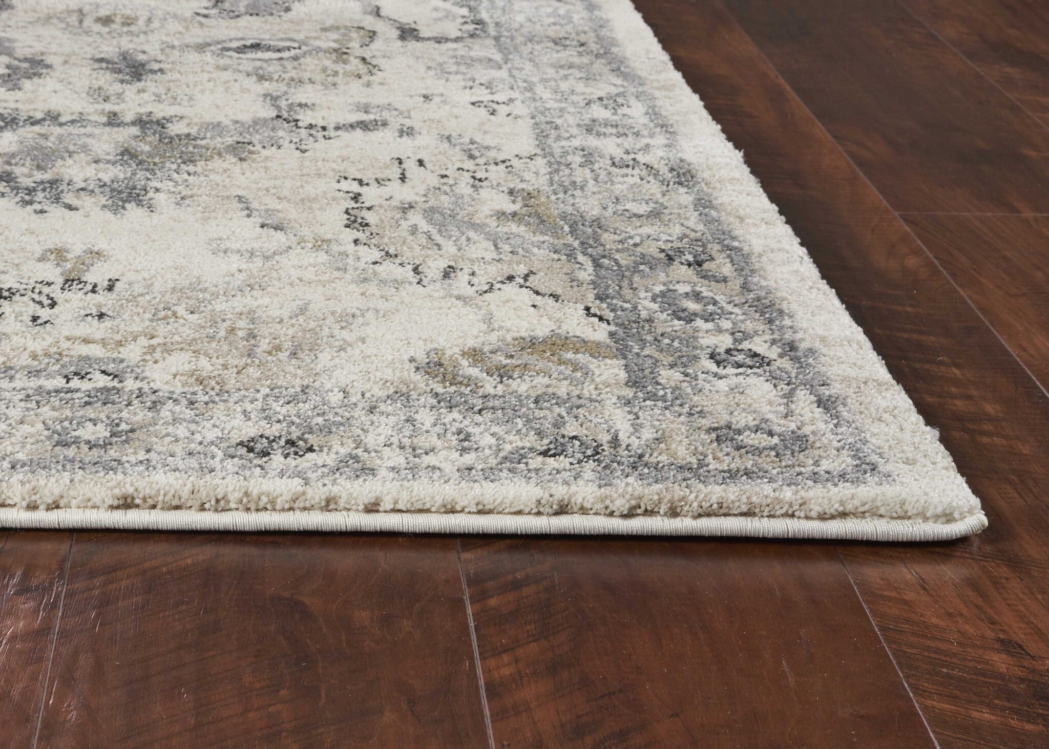 9' X 13' Ivory Machine Woven Distressed Floral Traditional Indoor Area Rug