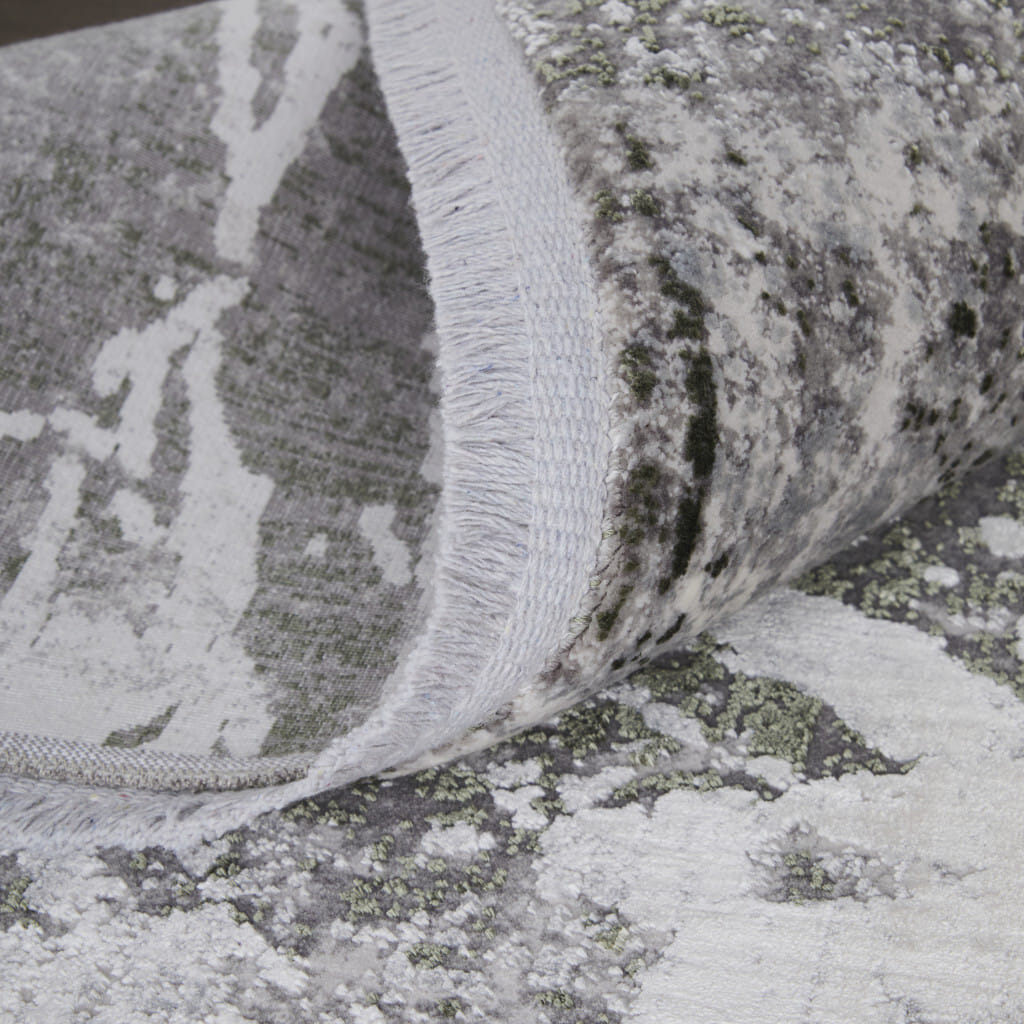 5' X 8' Taupe and Gray Abstract Power Loom Area Rug With Fringe