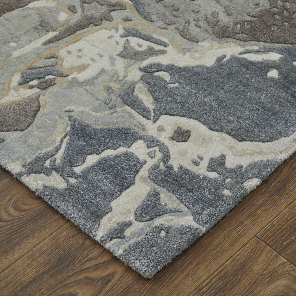 2' X 3' Ivory Taupe and Green Abstract Hand Tufted Worn Faded Area Rug