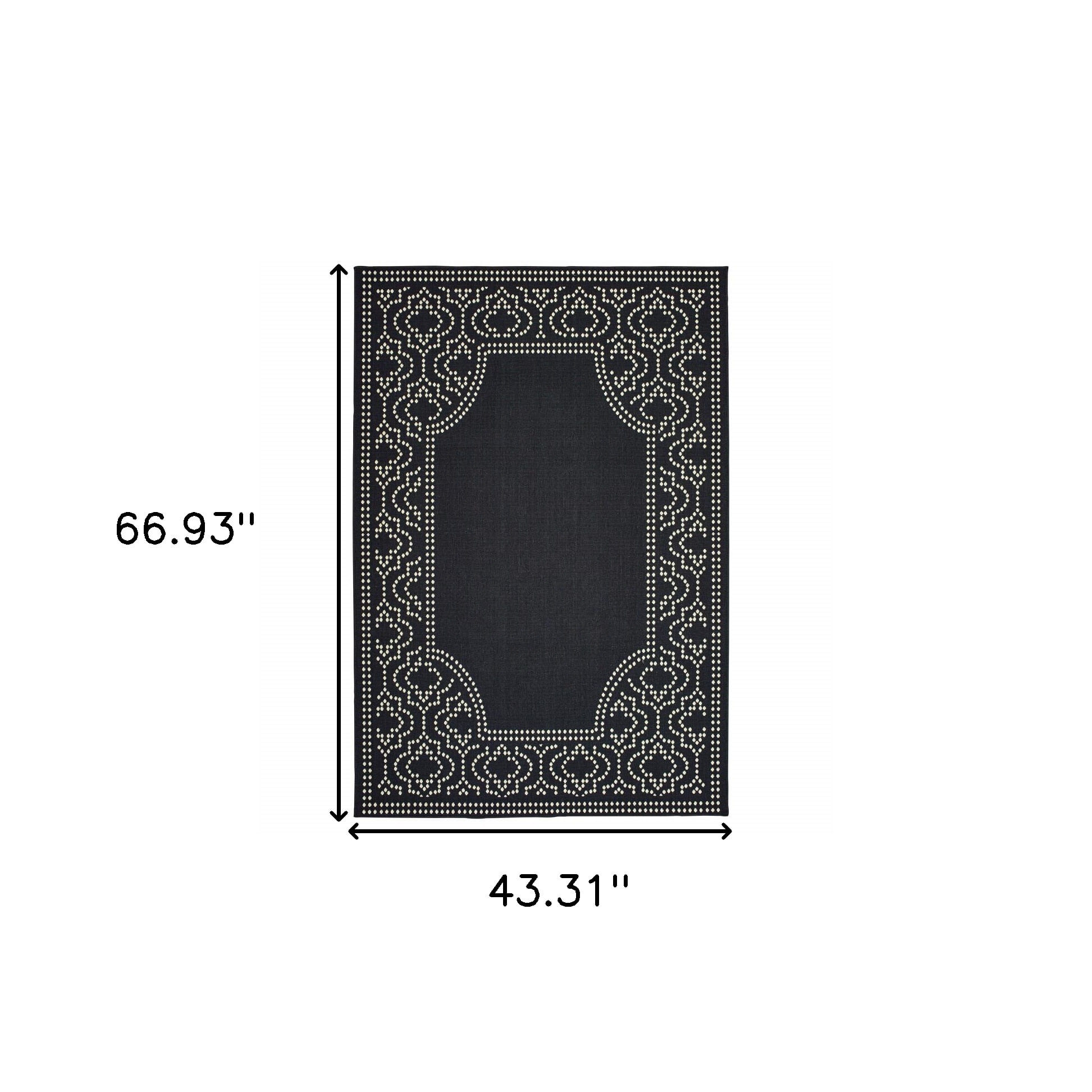 4' X 6' Black and Ivory Stain Resistant Indoor Outdoor Area Rug