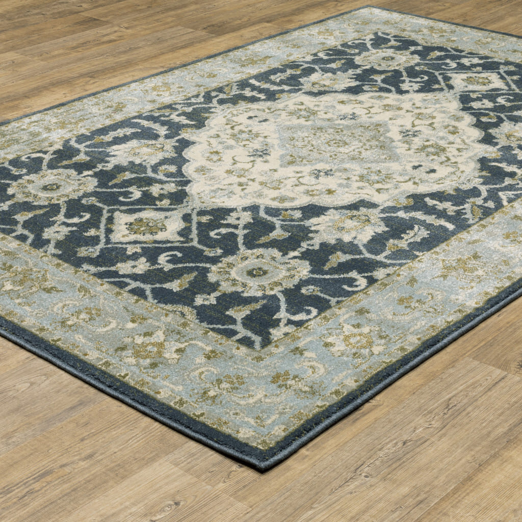 5' X 7' Teal Blue Ivory Green And Grey Oriental Power Loom Stain Resistant Area Rug
