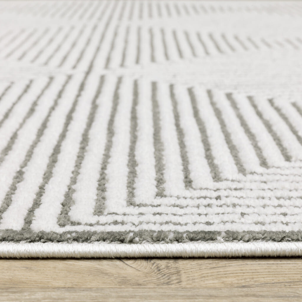 2' X 8' Grey And White Geometric Power Loom Stain Resistant Runner Rug