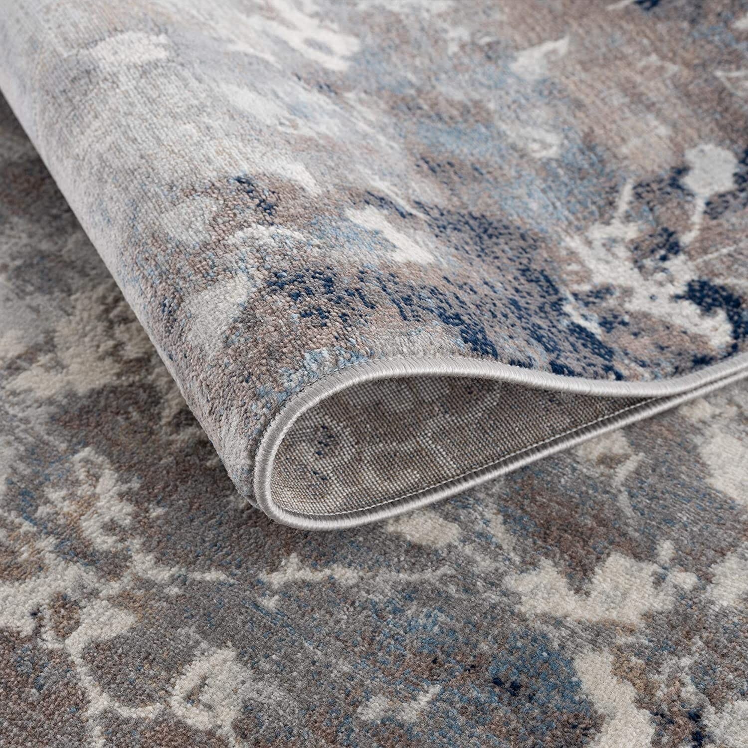 8' X 11' Navy And Beige Distressed Vines Area Rug