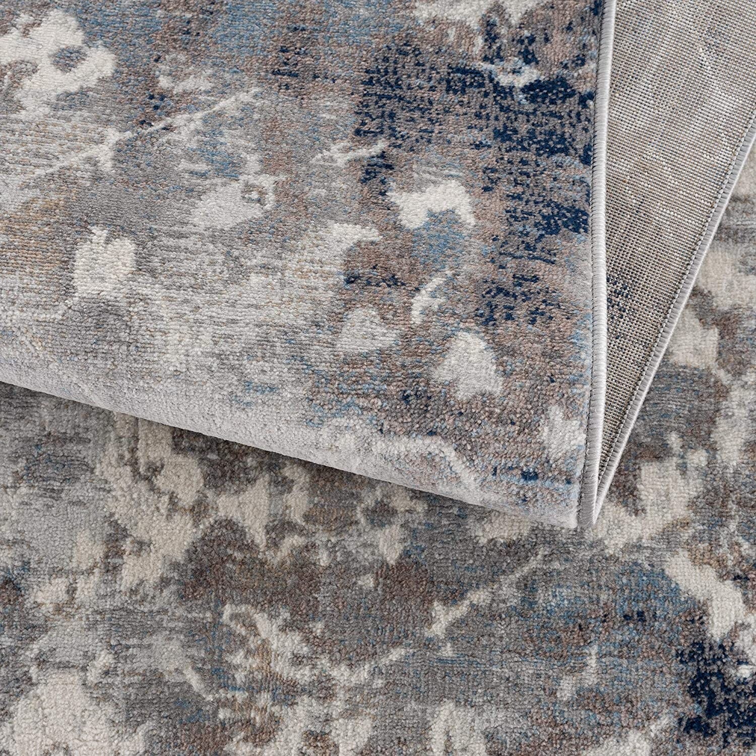 8' X 11' Navy And Beige Distressed Vines Area Rug