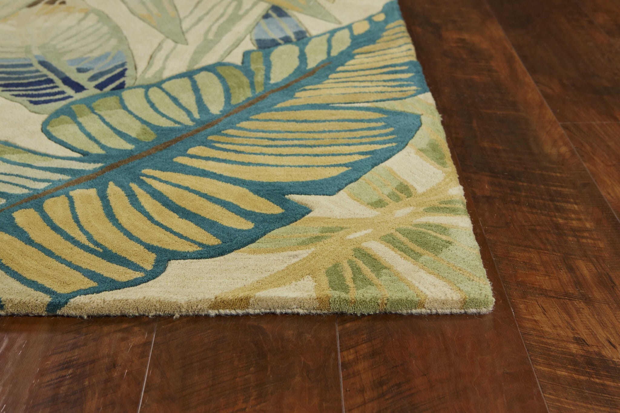 8' X 10' Ivory Teal Hand Tufted Tropical Leaves Indoor Area Rug