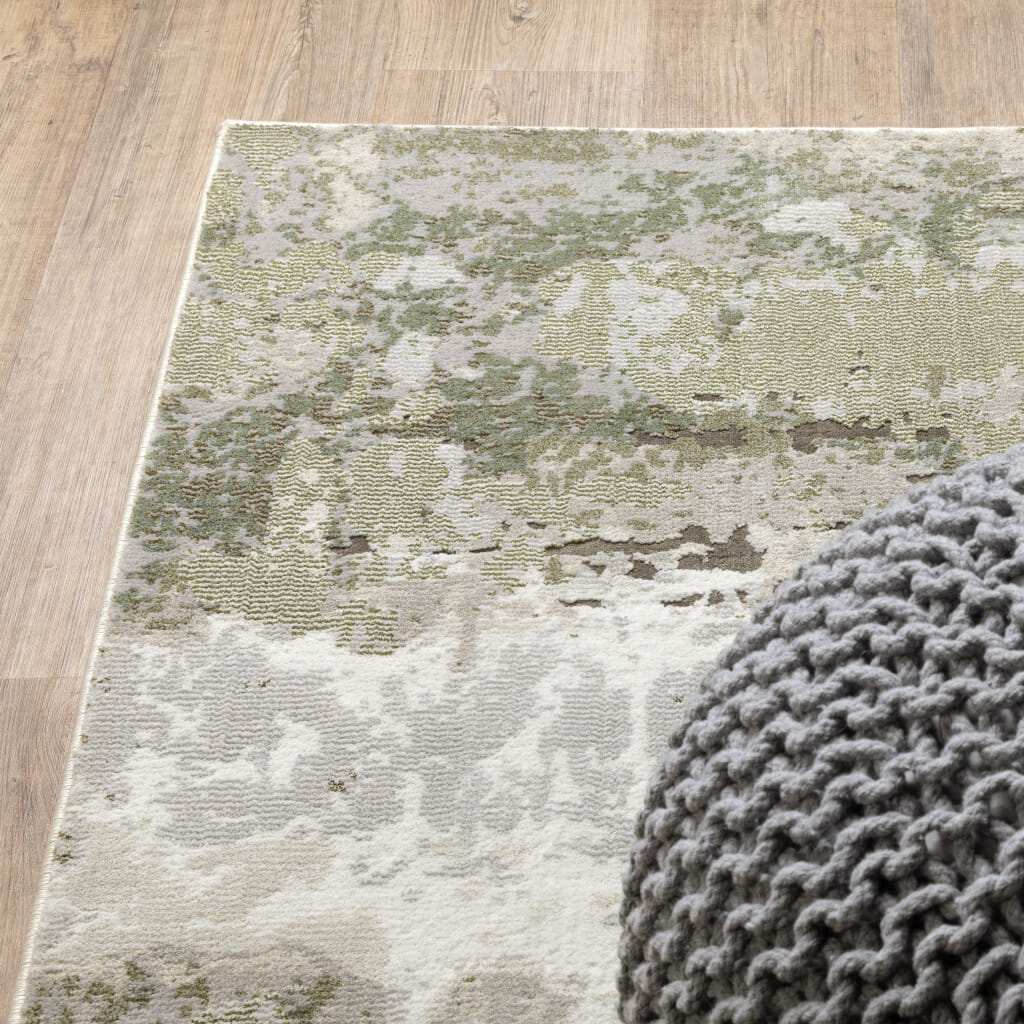 6' X 9' Beige Grey Brown And Sage Green Abstract Power Loom Stain Resistant Area Rug