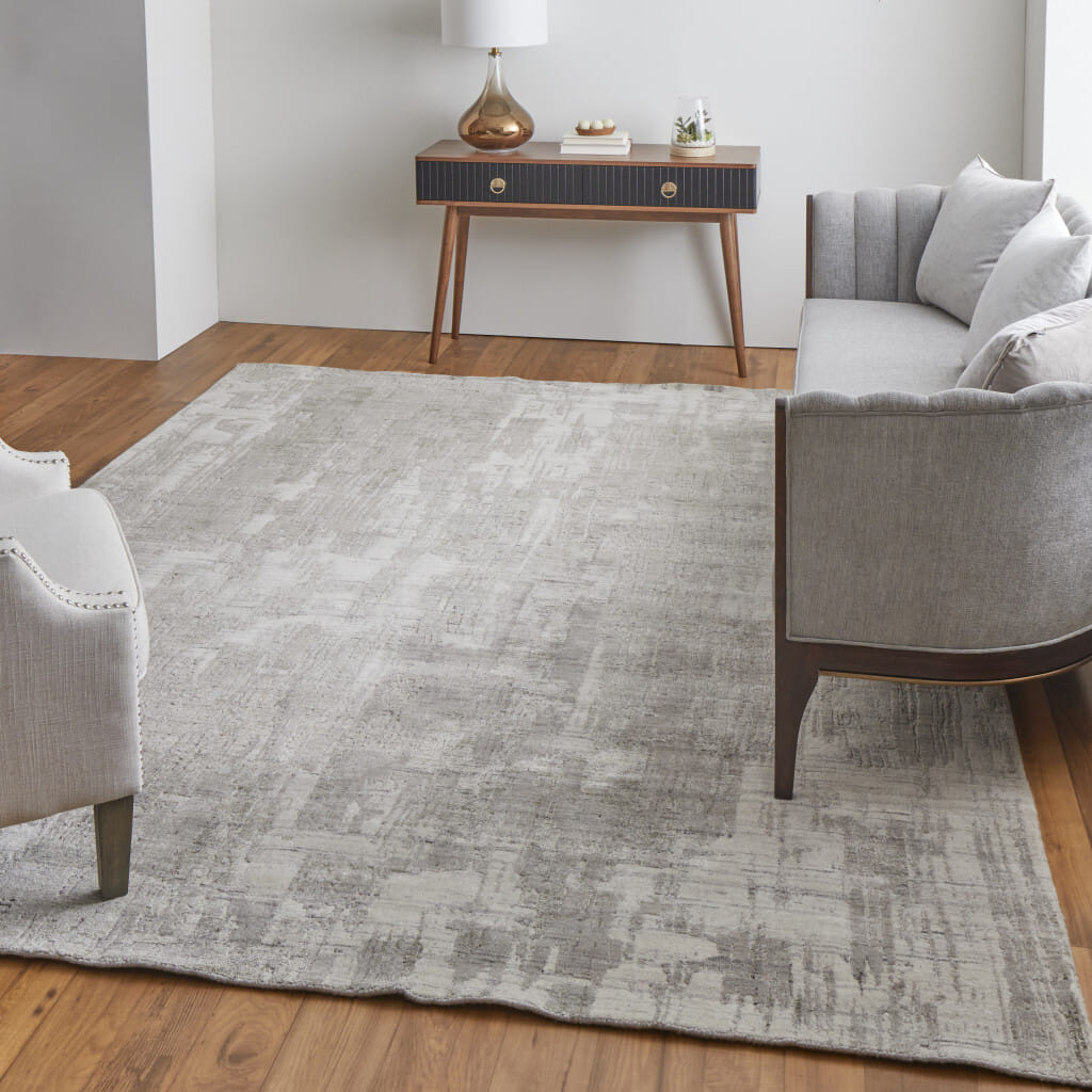 2' X 3' Gray and Ivory Abstract Hand Woven Worn Faded Area Rug