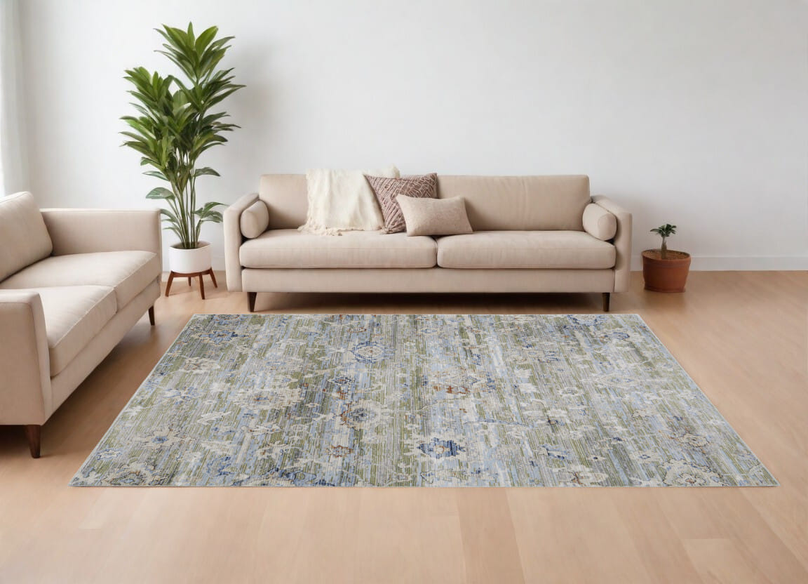 8' X 10' Ivory Green and Blue Floral Power Loom Worn Faded Area Rug