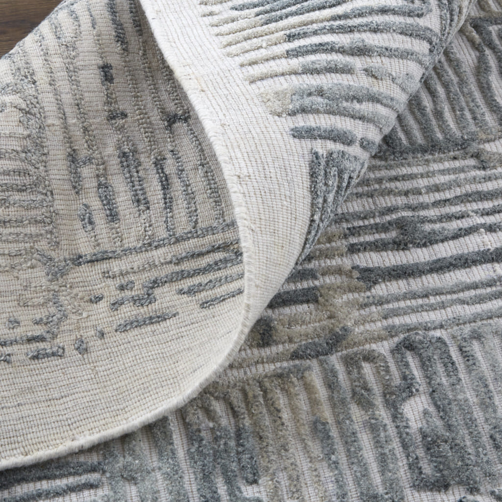 9' X 12' Green Blue And Ivory Abstract Hand Woven Area Rug