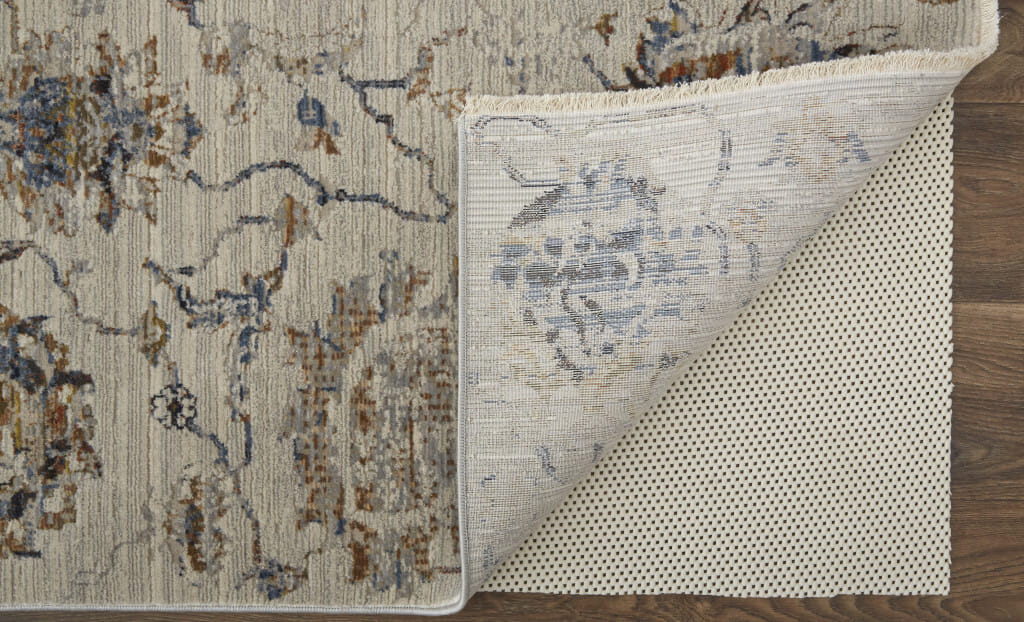 8' X 10' Ivory and Blue Floral Power Loom Distressed Non Skid Area Rug With Fringe