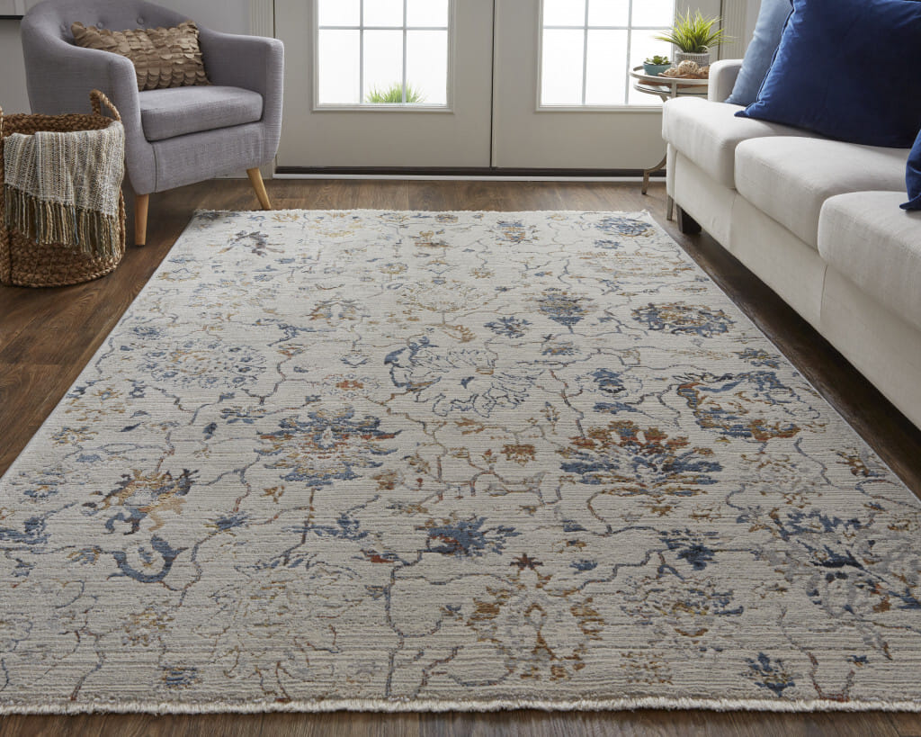 8' X 10' Ivory and Blue Floral Power Loom Distressed Non Skid Area Rug With Fringe