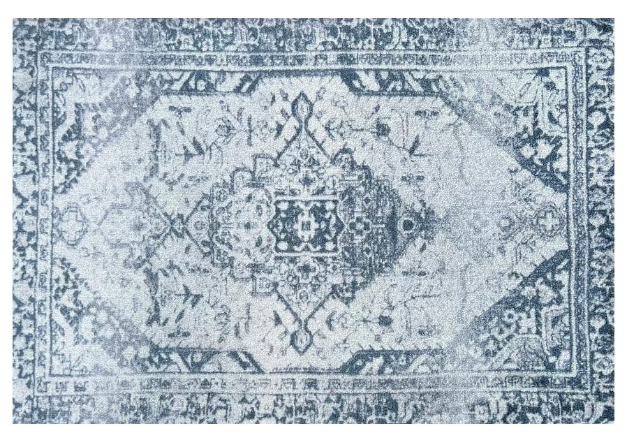 2' X 3' Dark Blue Gray and Ivory Oriental Distressed Washable Non Skid Area Rug With UV Protection