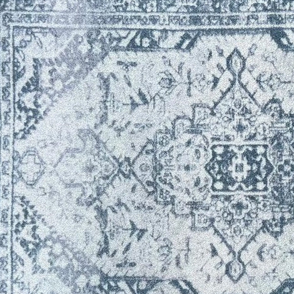 2' X 3' Dark Blue Gray and Ivory Oriental Distressed Washable Non Skid Area Rug With UV Protection