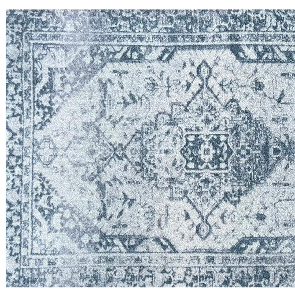 2' X 3' Dark Blue Gray and Ivory Oriental Distressed Washable Non Skid Area Rug With UV Protection