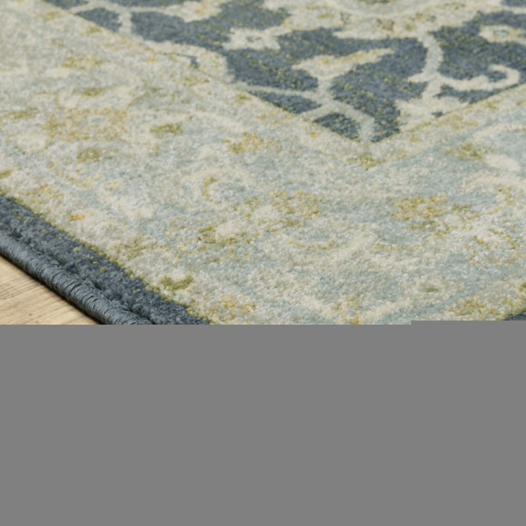6' X 9' Teal Blue Ivory Green And Grey Oriental Power Loom Stain Resistant Area Rug