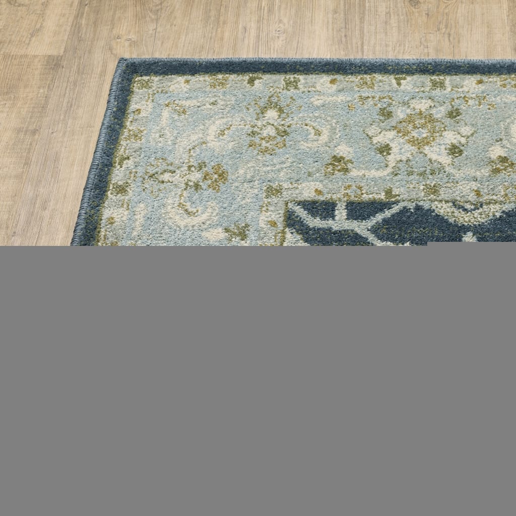 6' X 9' Teal Blue Ivory Green And Grey Oriental Power Loom Stain Resistant Area Rug