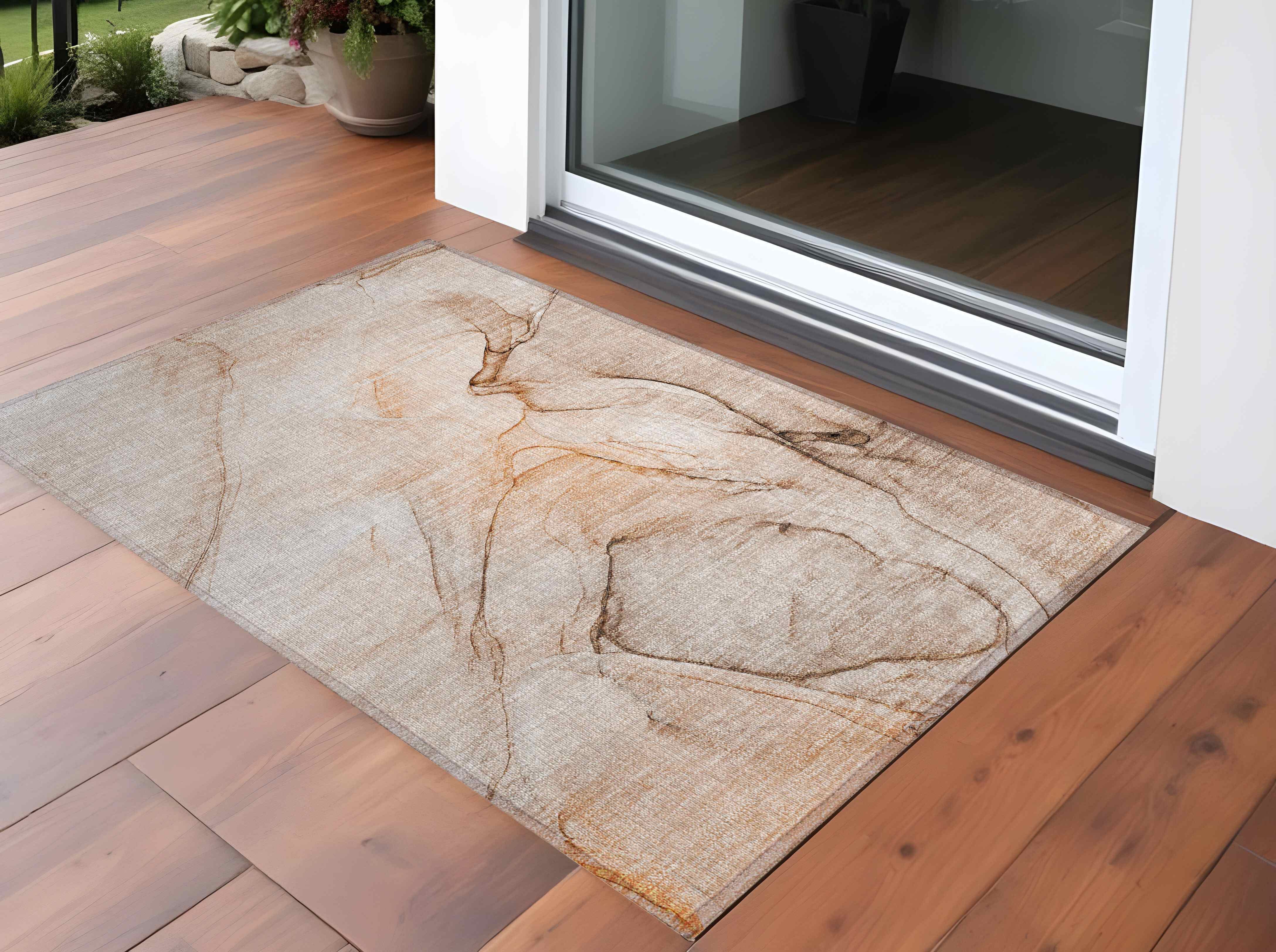 2' X 3' Gray and Orange Abstract Washable Non Skid Indoor Outdoor Area Rug