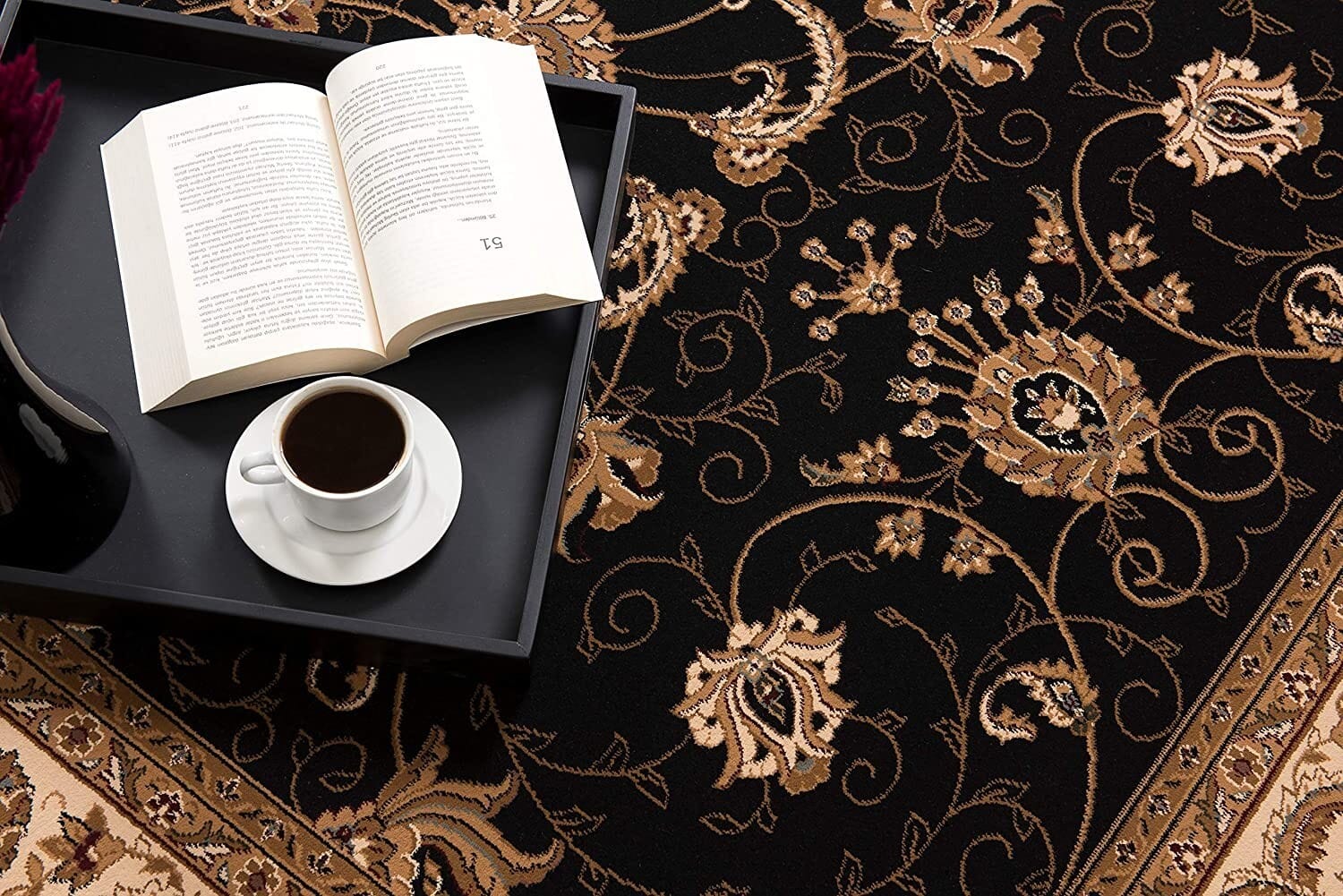 5' X 8' Black and Ivory Oriental Power Loom Area Rug