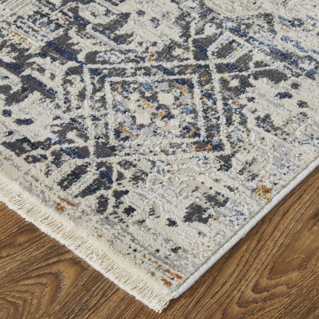 3' X 5' Ivory and Gray Abstract Power Loom Worn Faded Area Rug With Fringe