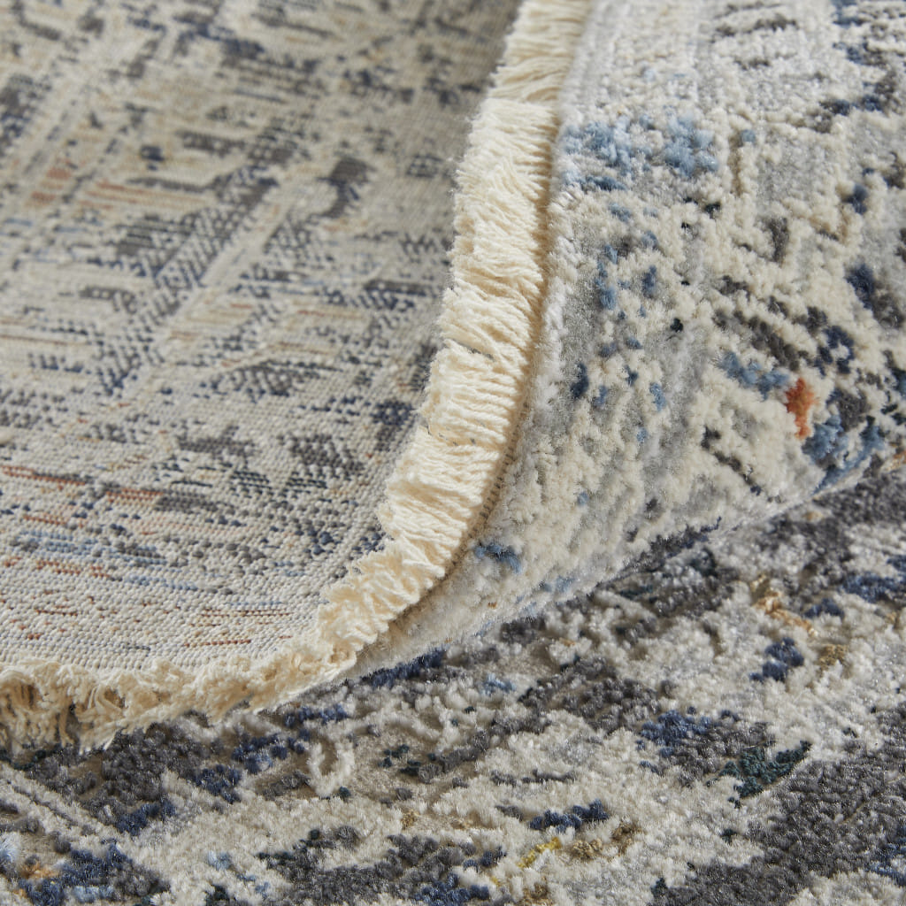 3' X 5' Ivory and Gray Abstract Power Loom Worn Faded Area Rug With Fringe