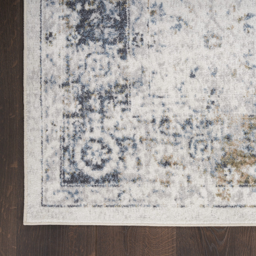 9' X 12' Blue and Ivory Floral Medallion Power Loom Distressed Washable Area Rug