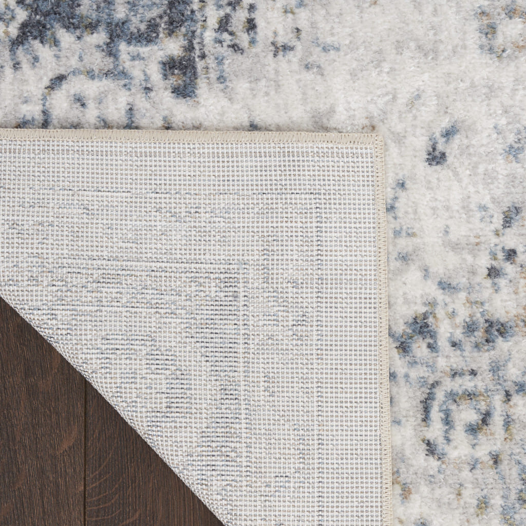 9' X 12' Blue and Ivory Floral Medallion Power Loom Distressed Washable Area Rug
