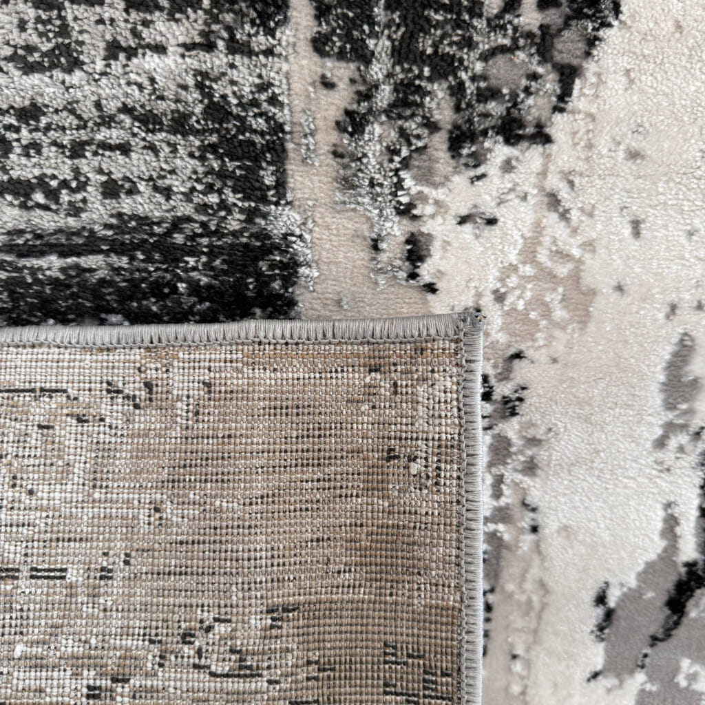 5' X 8' Black Gray and Beige Abstract Area Rug
