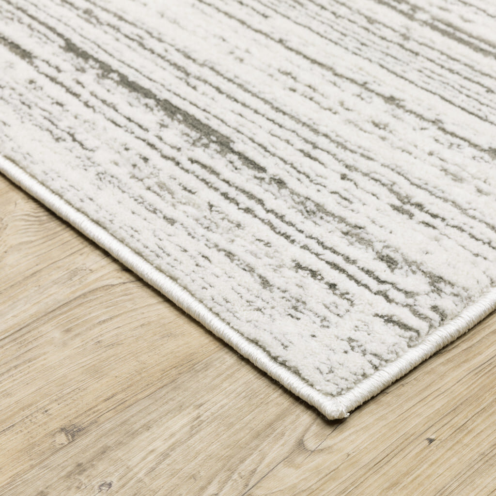 7' X 10' Gray and White Abstract Power Loom Area Rug