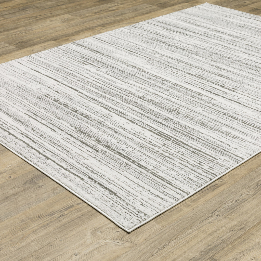 7' X 10' Gray and White Abstract Power Loom Area Rug