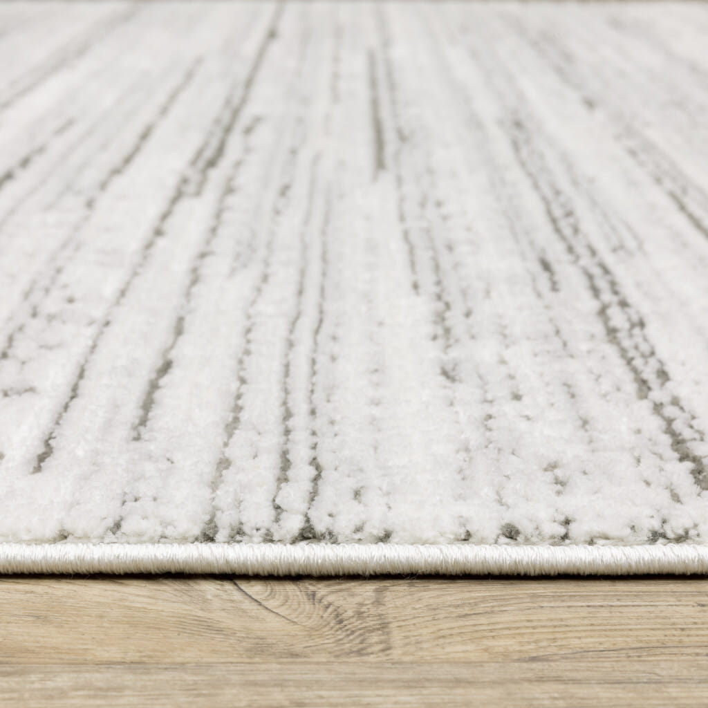 7' X 10' Gray and White Abstract Power Loom Area Rug
