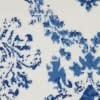 5' X 7' Blue And Ivory Floral Dhurrie Area Rug