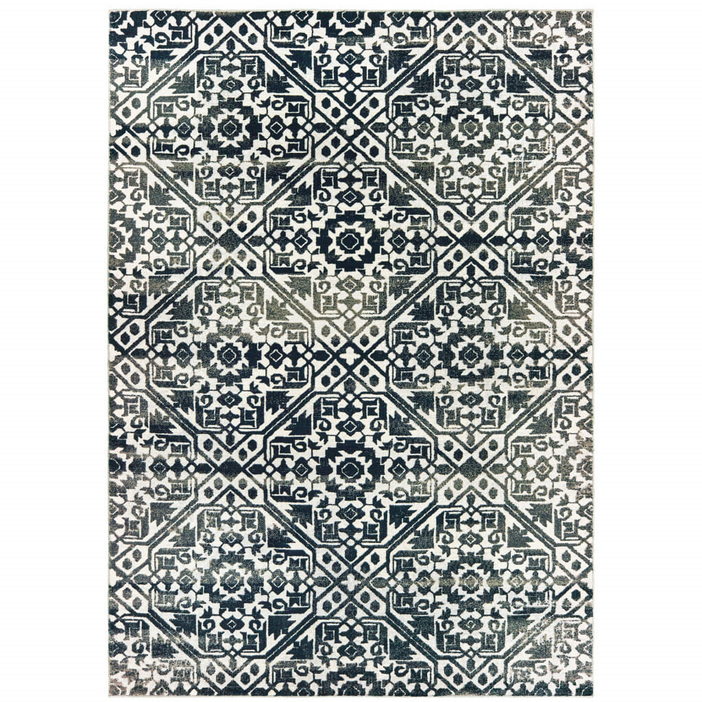 7' X 10' Blue and Ivory Geometric Power Loom Area Rug