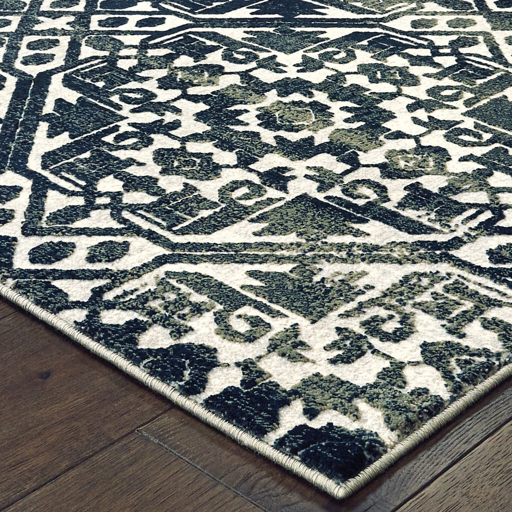 7' X 10' Blue and Ivory Geometric Power Loom Area Rug