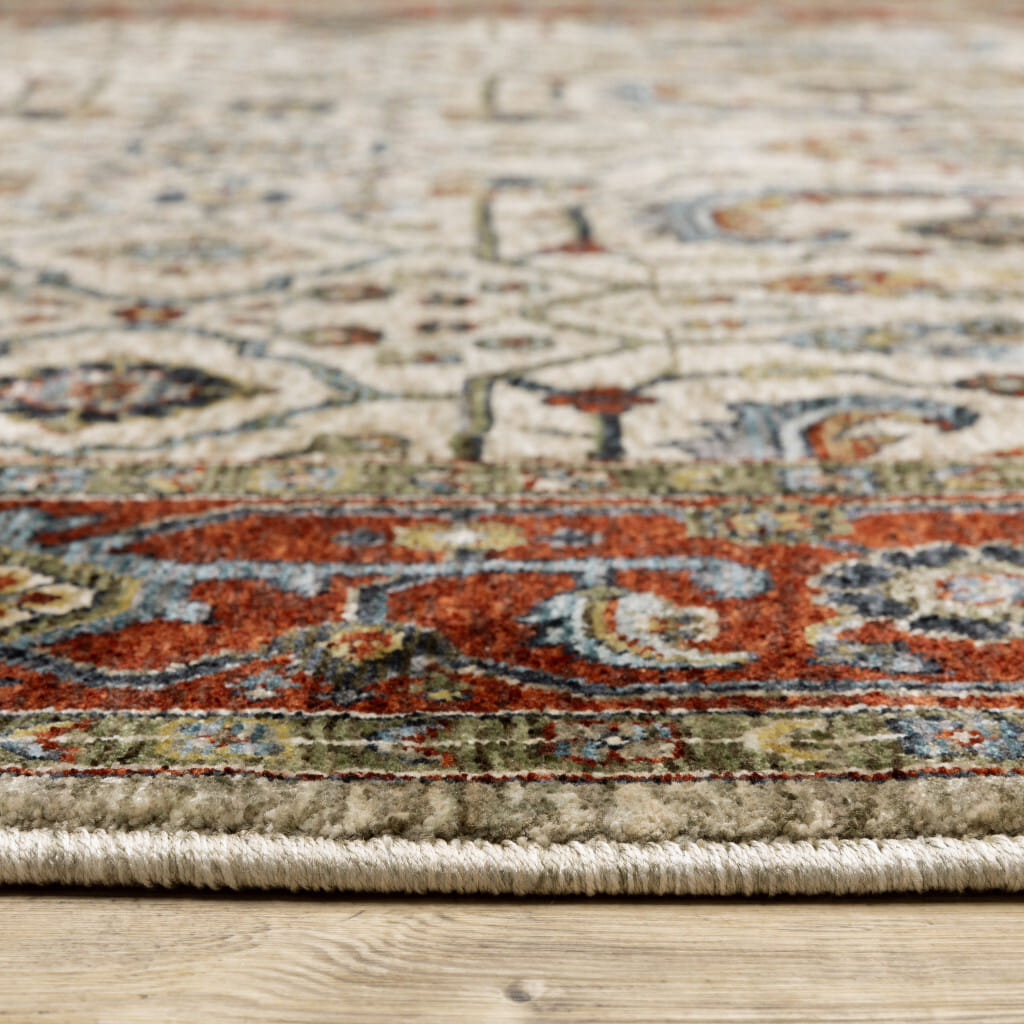 5' X 8' Ivory Red Green Grey Blue And Navy Oriental Power Loom Stain Resistant Area Rug With Fringe