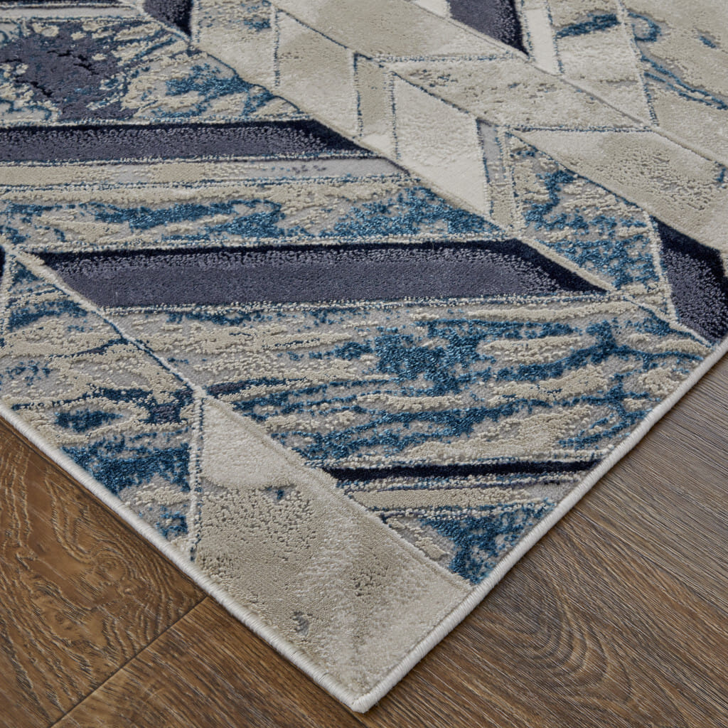 10' X 13' Ivory Blue And Gray Chevron Power Loom Distressed Area Rug