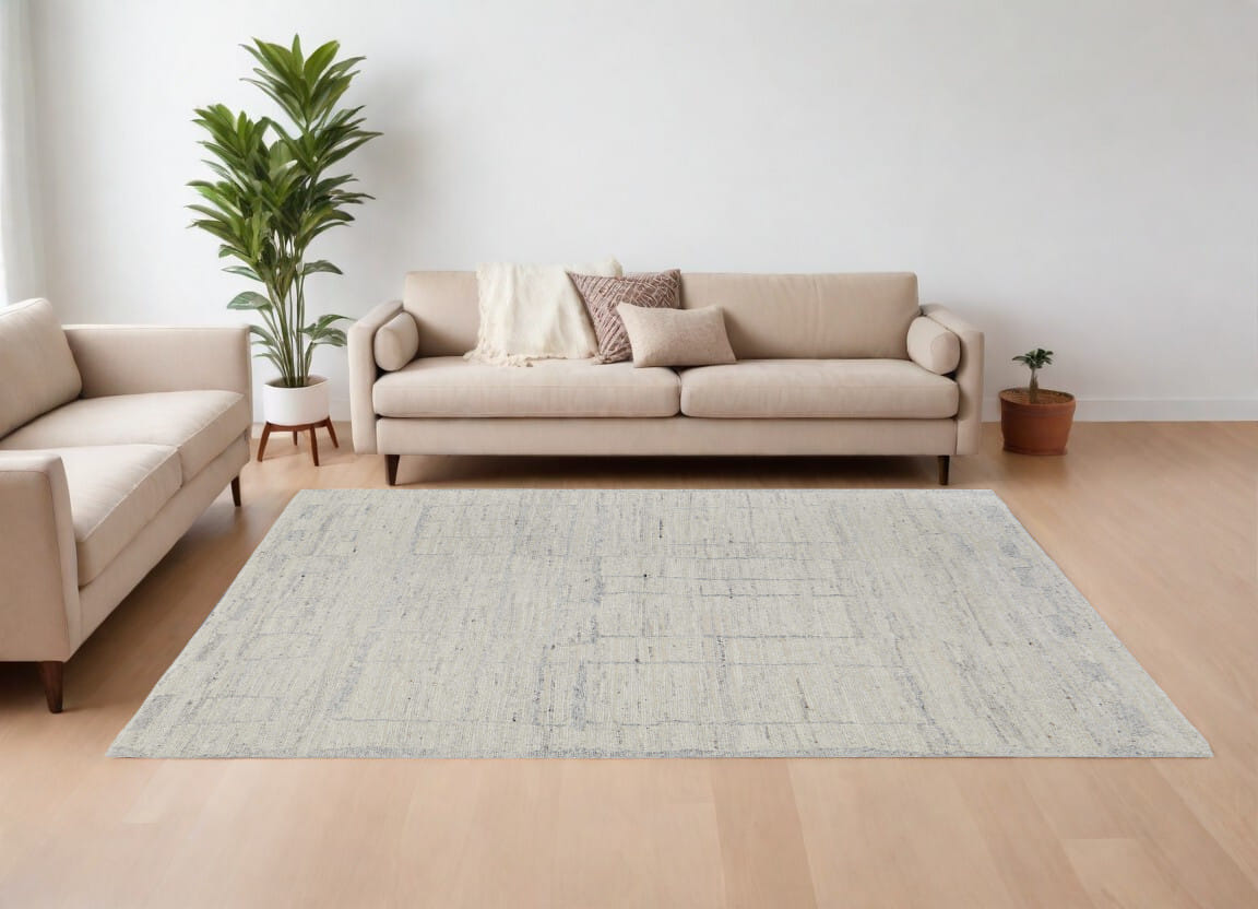 6' X 9' Gray and Ivory Abstract Hand Woven Worn Faded Area Rug