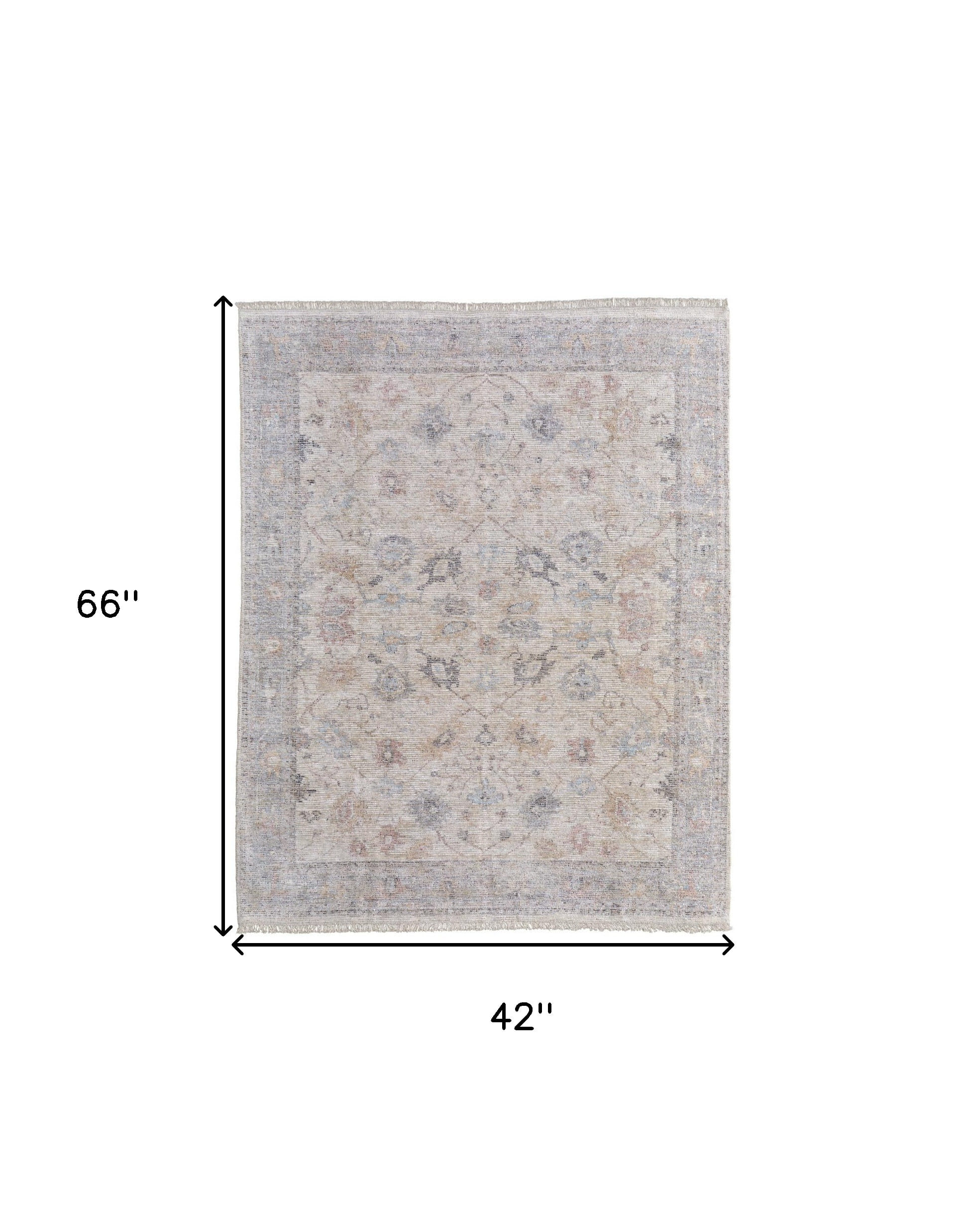 4' X 6' Ivory Tan and Blue Floral Hand Woven Distressed Area Rug With Fringe