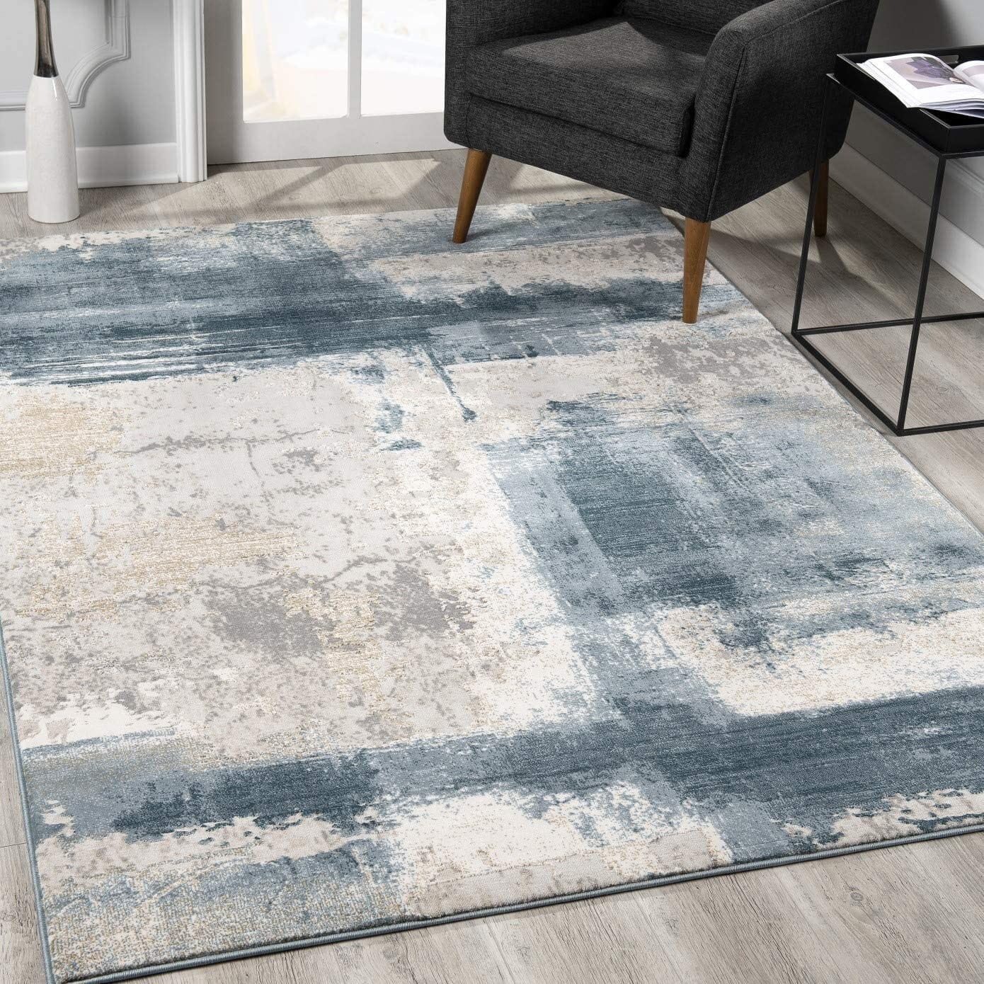 5' X 7' Blue And Ivory Abstract Dhurrie Area Rug