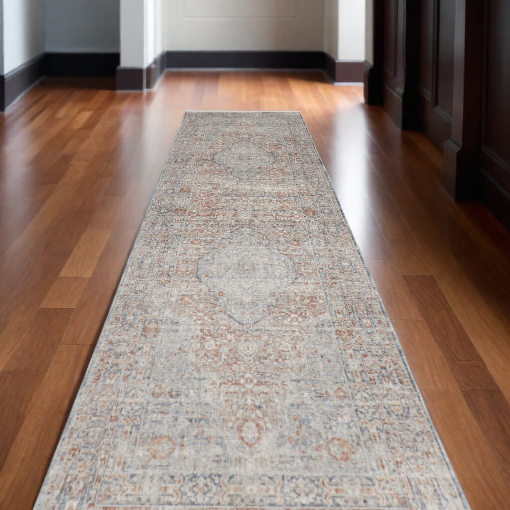 12' Gray Ivory and Orange Oriental Power Loom Worn Faded Runner Rug With Fringe