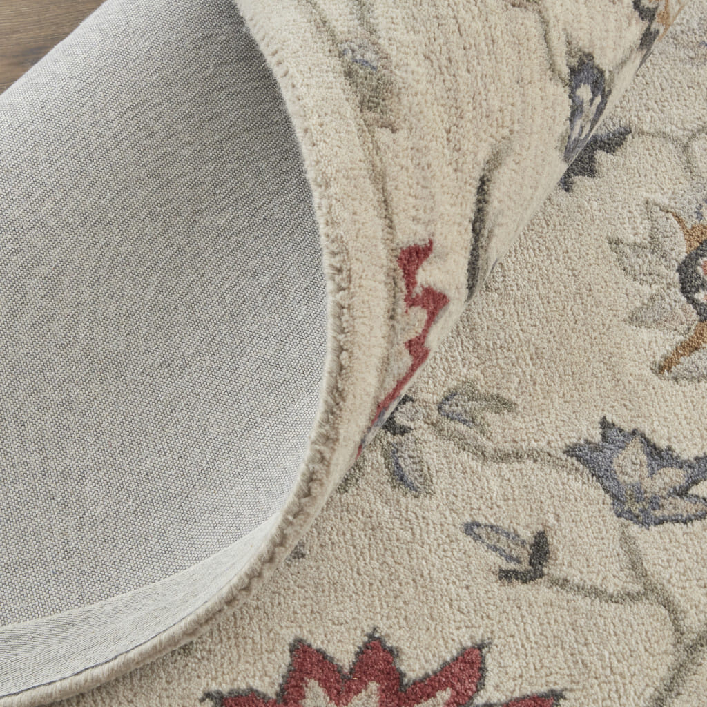 9' X 12' Ivory and Blue Wool Floral Hand Tufted Area Rug