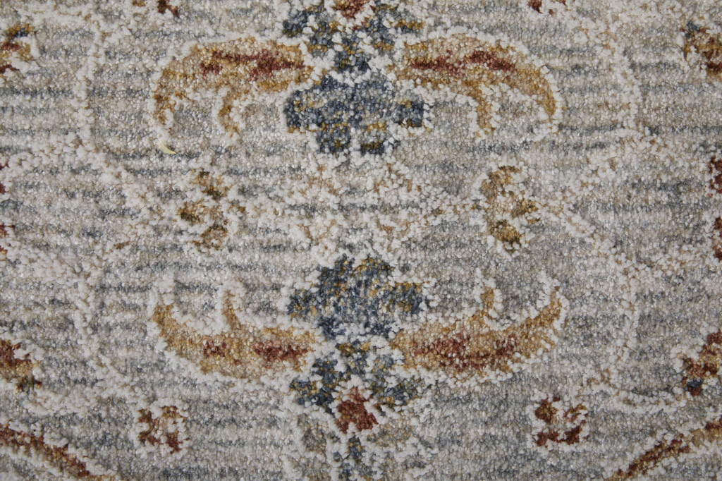 2' X 3' Ivory Taupe and Blue Ikat Power Loom Worn Faded Area Rug With Fringe
