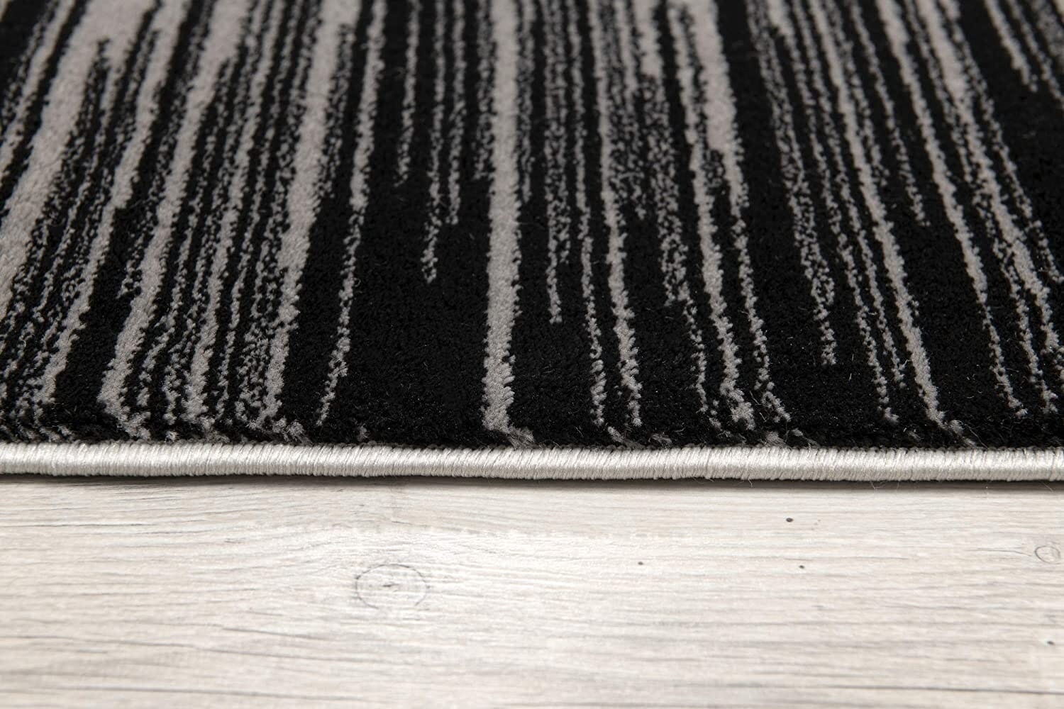 5' X 7' Black Abstract Dhurrie Area Rug