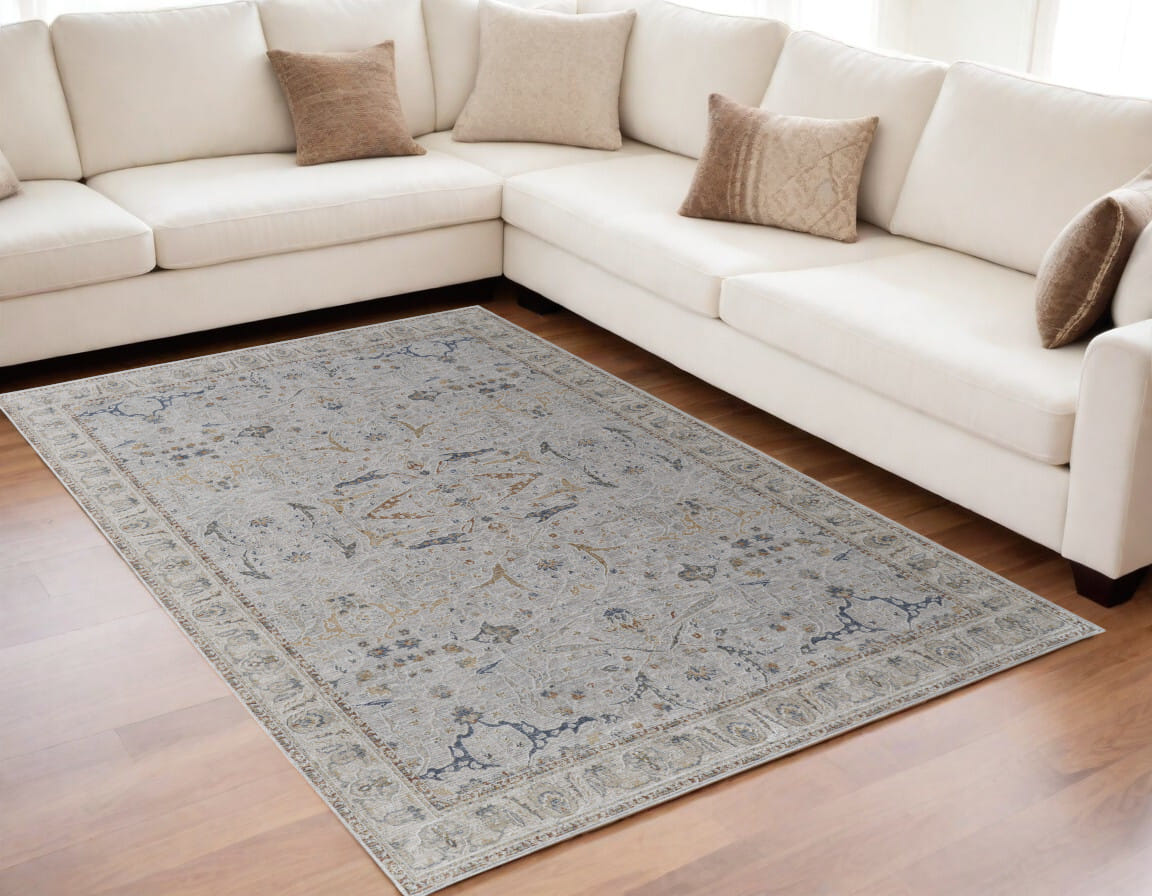 5' X 8' Gray Blue and Red Ikat Power Loom Worn Faded Area Rug With Fringe