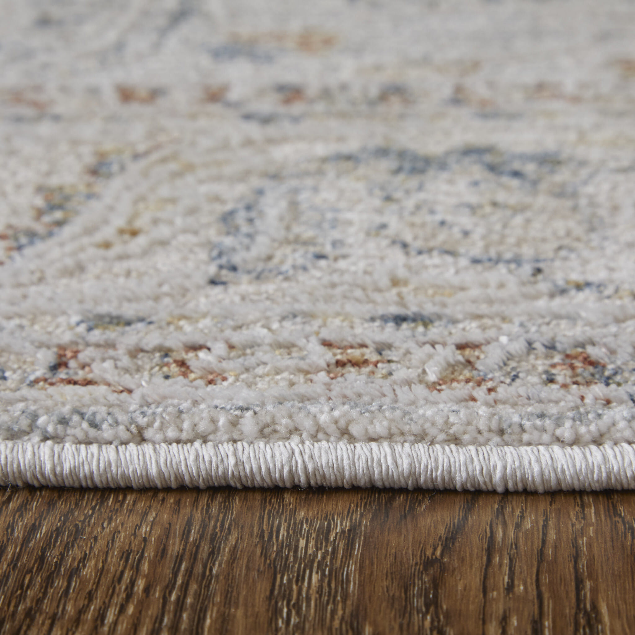 5' X 8' Gray Blue and Red Ikat Power Loom Worn Faded Area Rug With Fringe