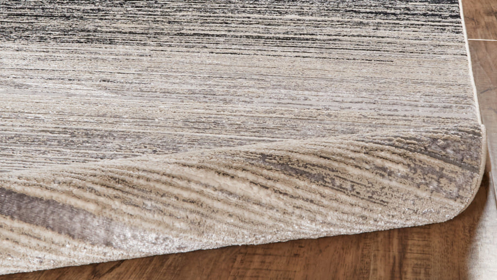 5' X 8' Beige and Black Abstract Non Skid Area Rug