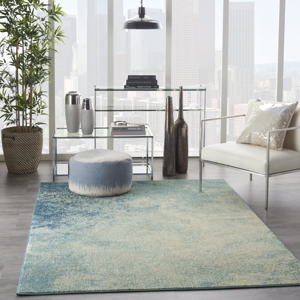 4' X 6' Ivory And Blue Abstract Power Loom Area Rug