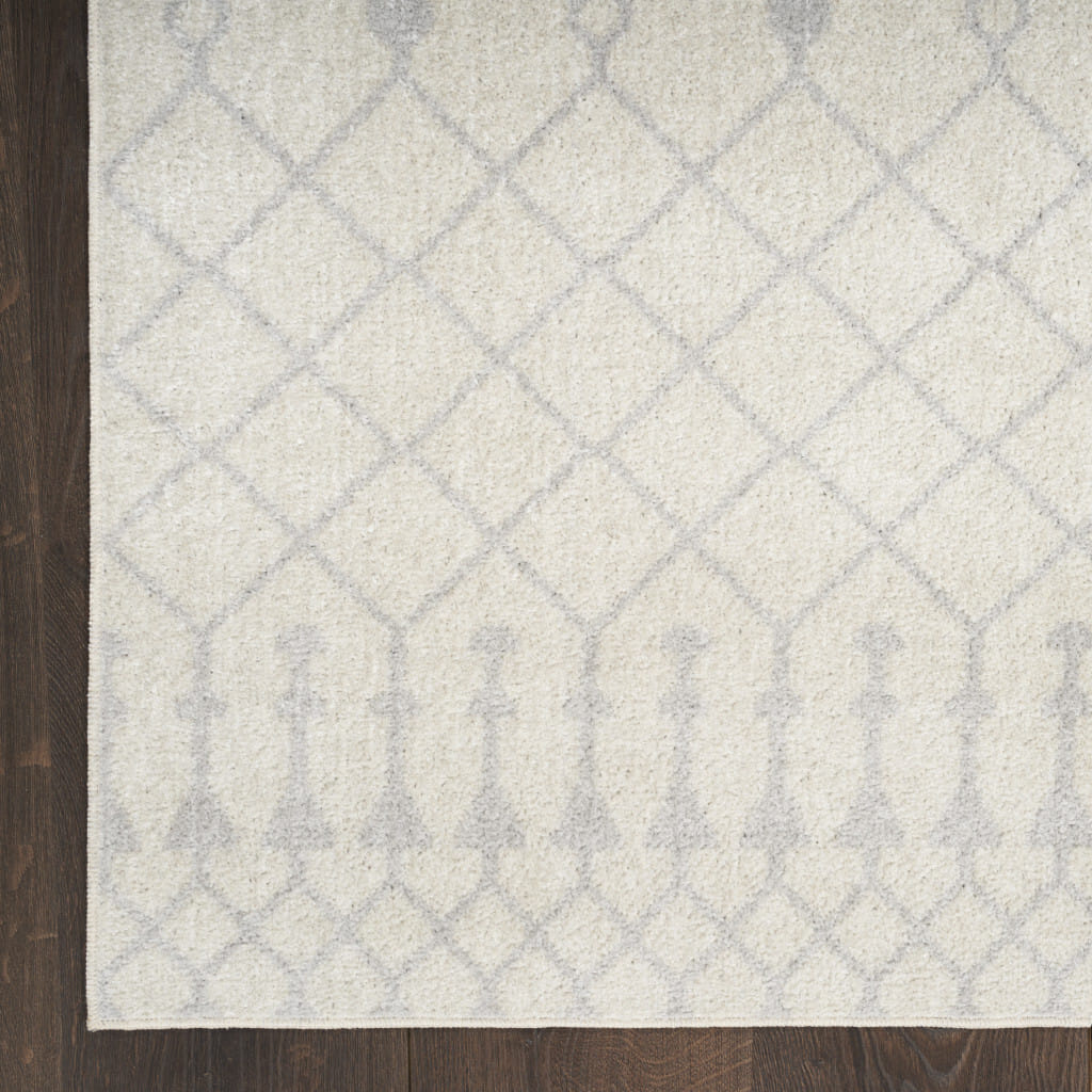 8' X 10' Blue and Ivory Abstract Power Loom Washable Area Rug