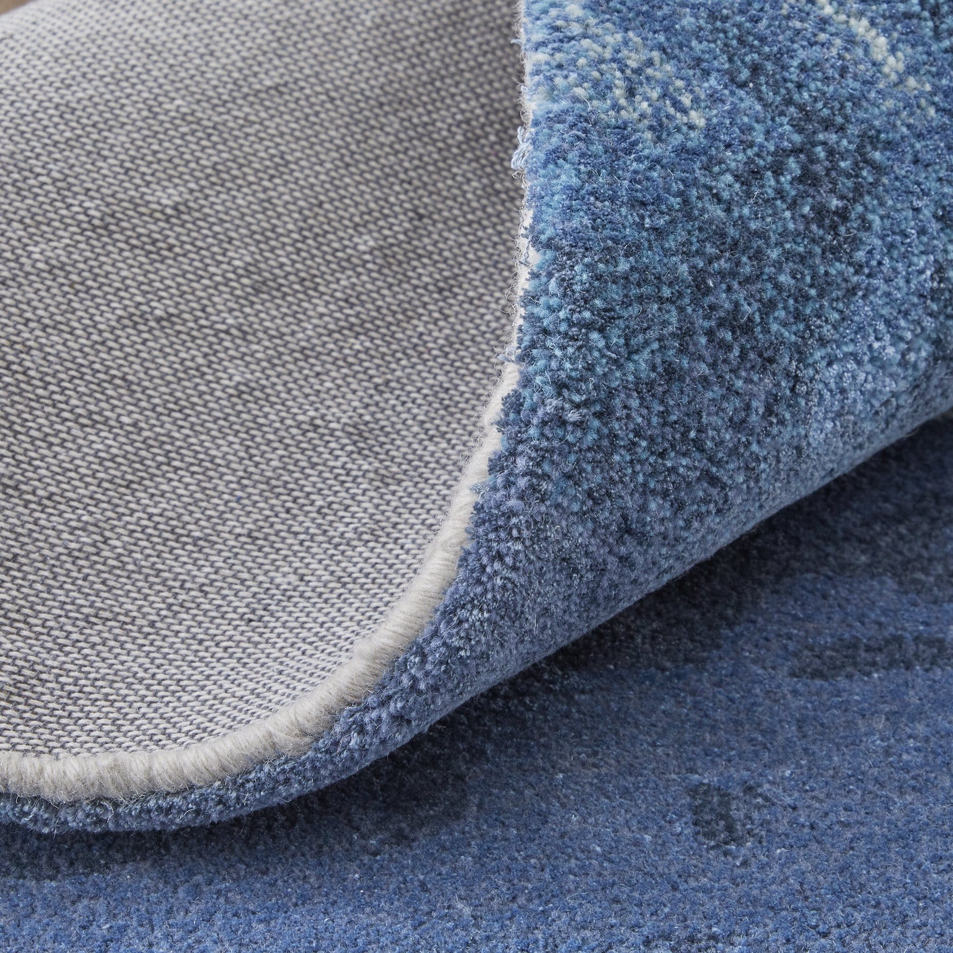 9' X 12' Blue and Ivory Abstract Hand Tufted Area Rug