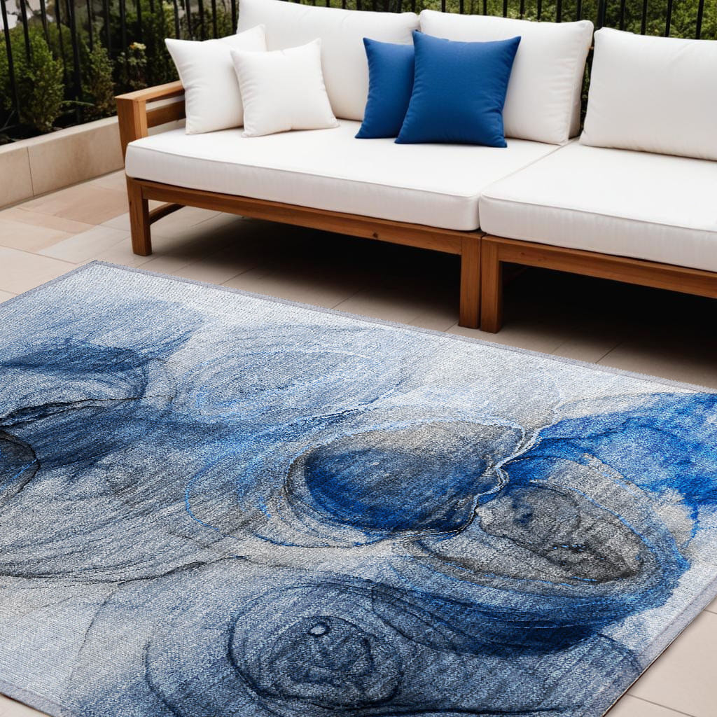 8' X 10' Ivory Blue and Gray Abstract Washable Non Skid Indoor Outdoor Area Rug
